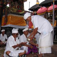 WATER - Tirtha - I Made Kulit Dalem Kuni receive tirtha during temple consecration 